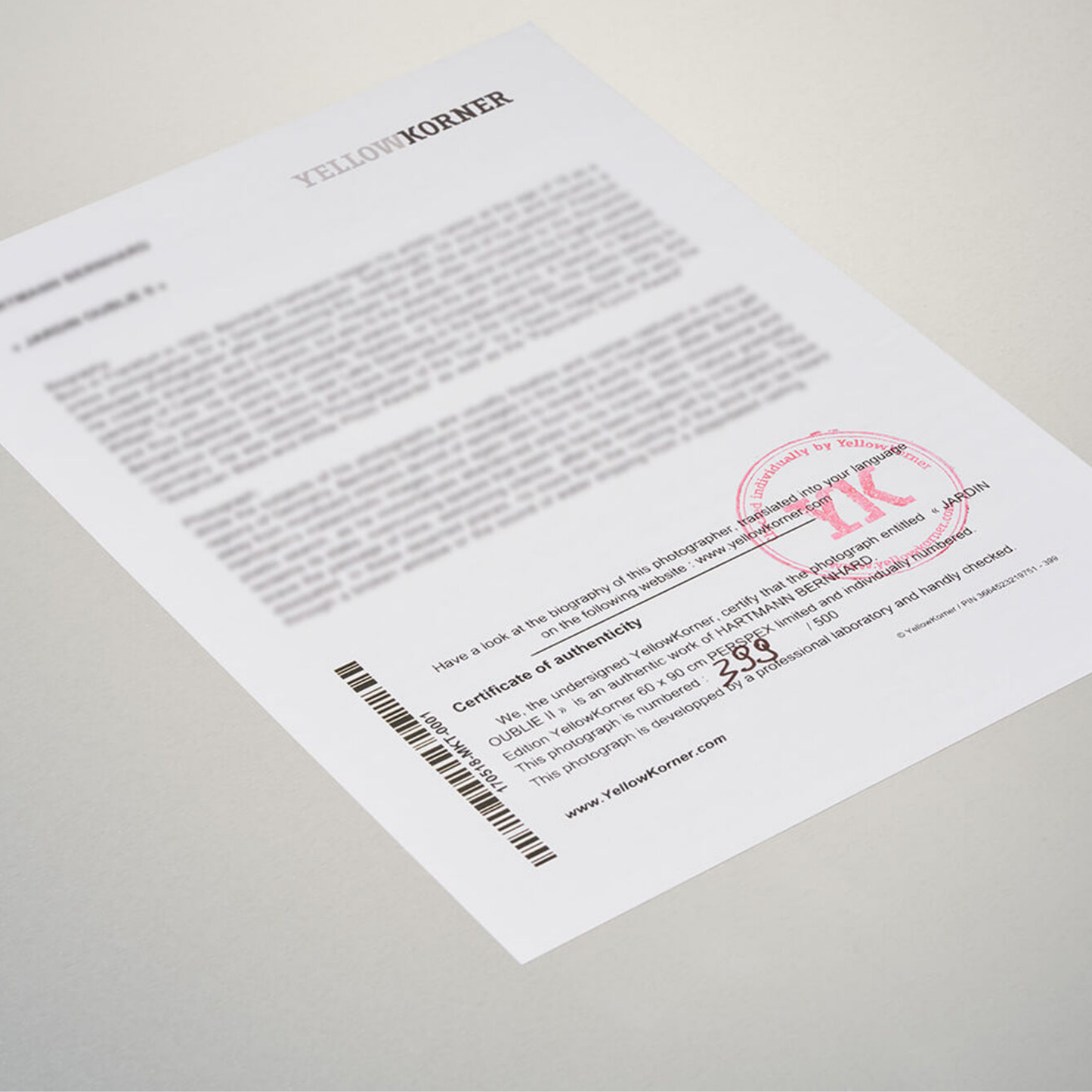 Certificate of authenticity with a red stamp on a white background