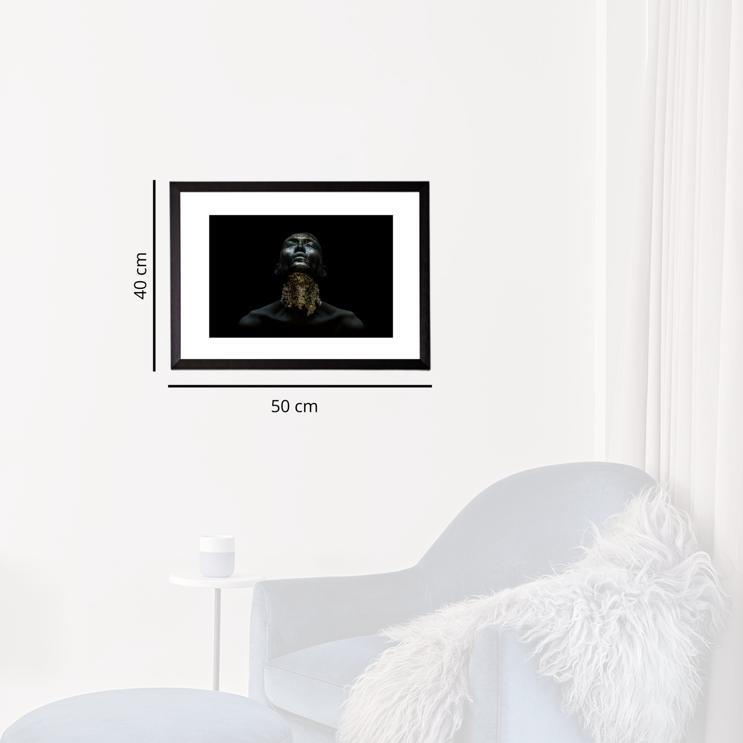 Framed artwork on a white wall with dimensions indicated