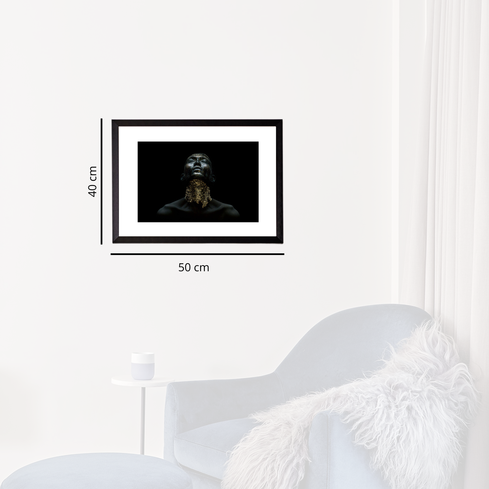 Framed artwork on a white wall with dimensions indicated