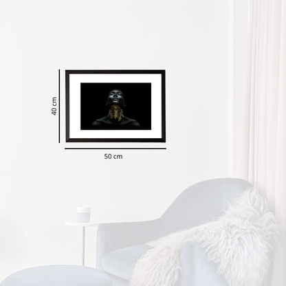 Framed artwork on a white wall with dimensions indicated