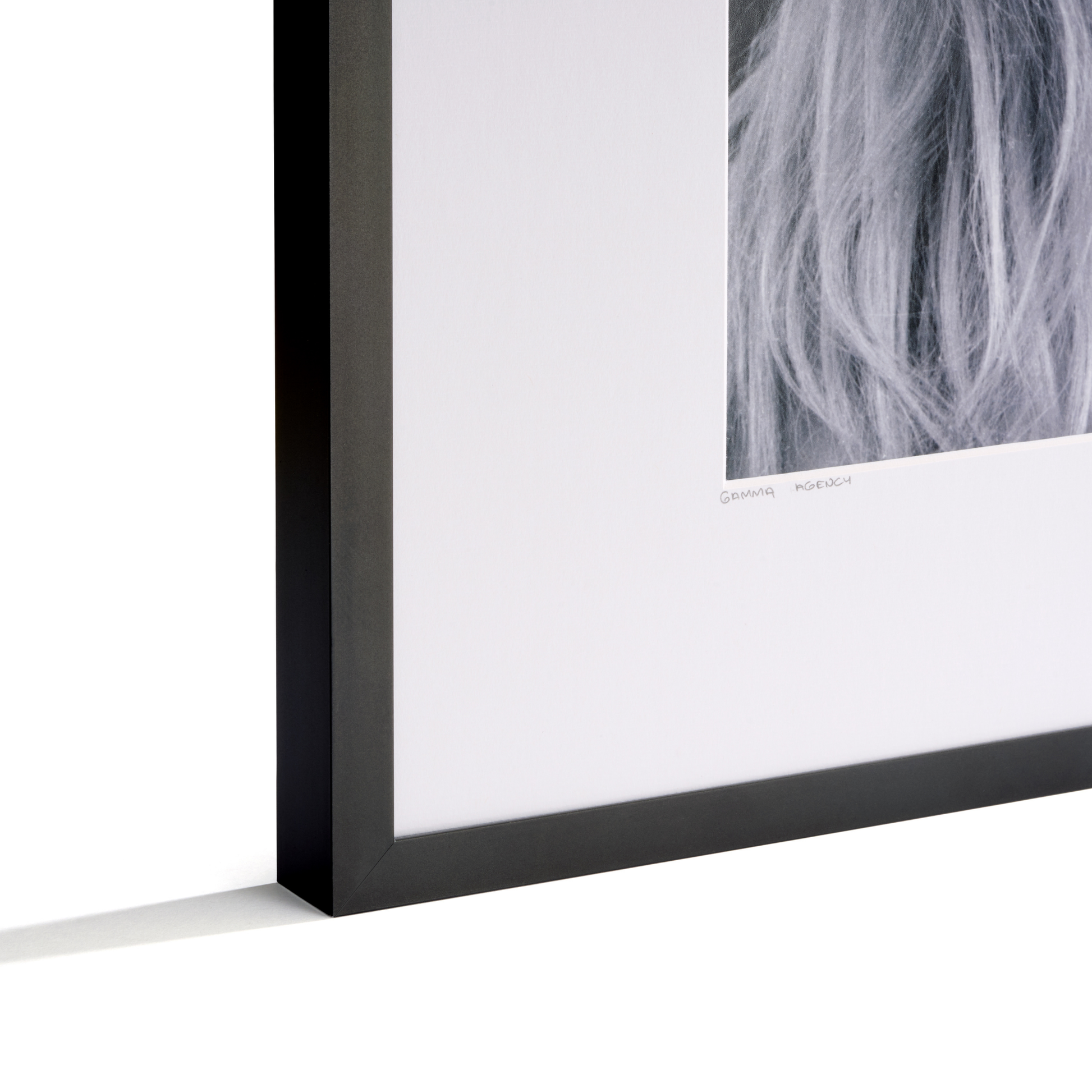 Framed artwork with a black border on a white background
