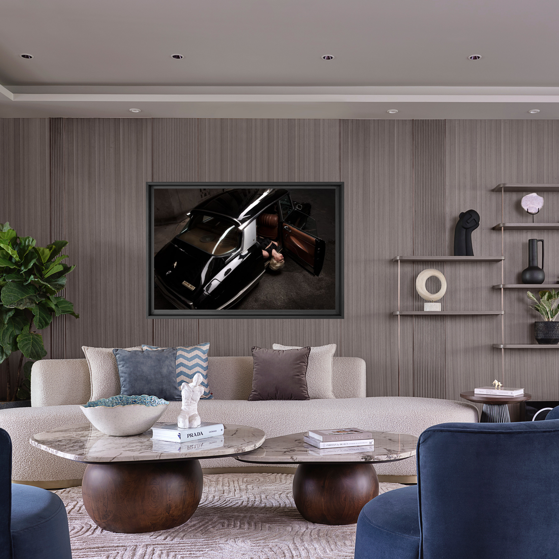 Modern living room with a sofa, coffee table, and wall art.