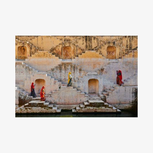 Stepwell with people in traditional attire on a white background