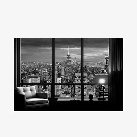 Cityscape view from a window with a modern interior.