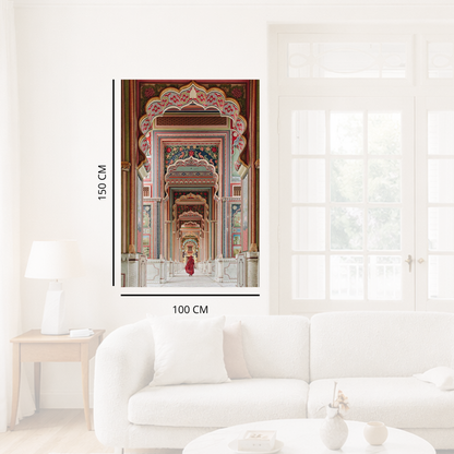 Framed artwork of a colorful architectural scene in a living room setting