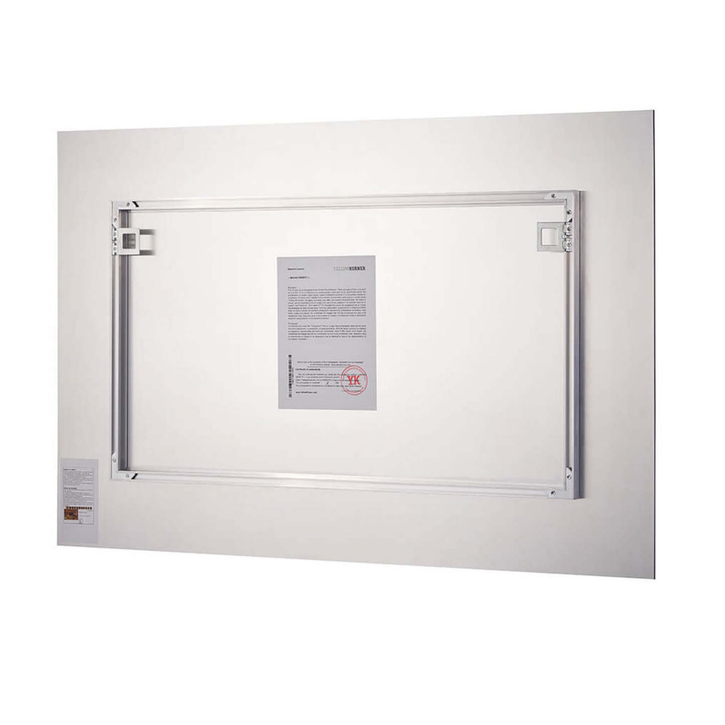 White framed mirror with metallic border on a white background
