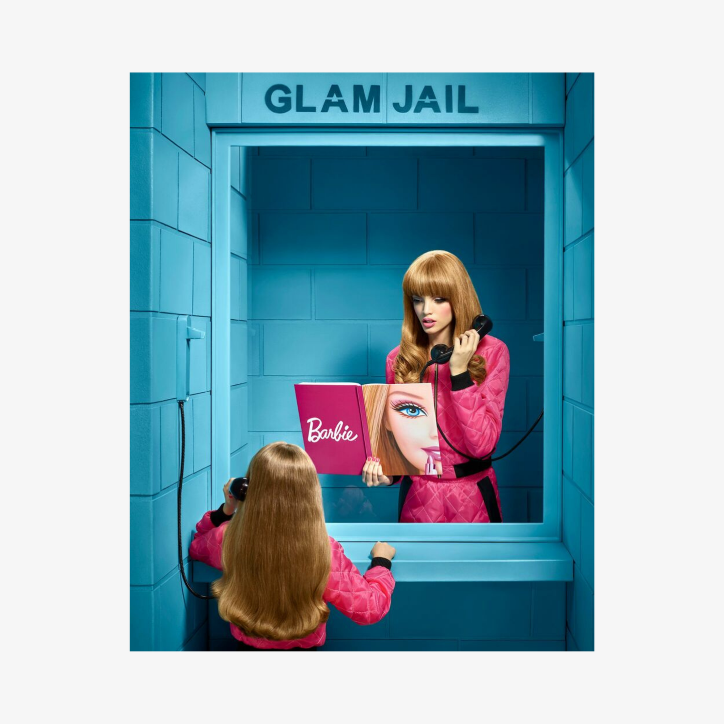 Barbie doll in a 'Glam Jail' with a mirror and Barbie book.