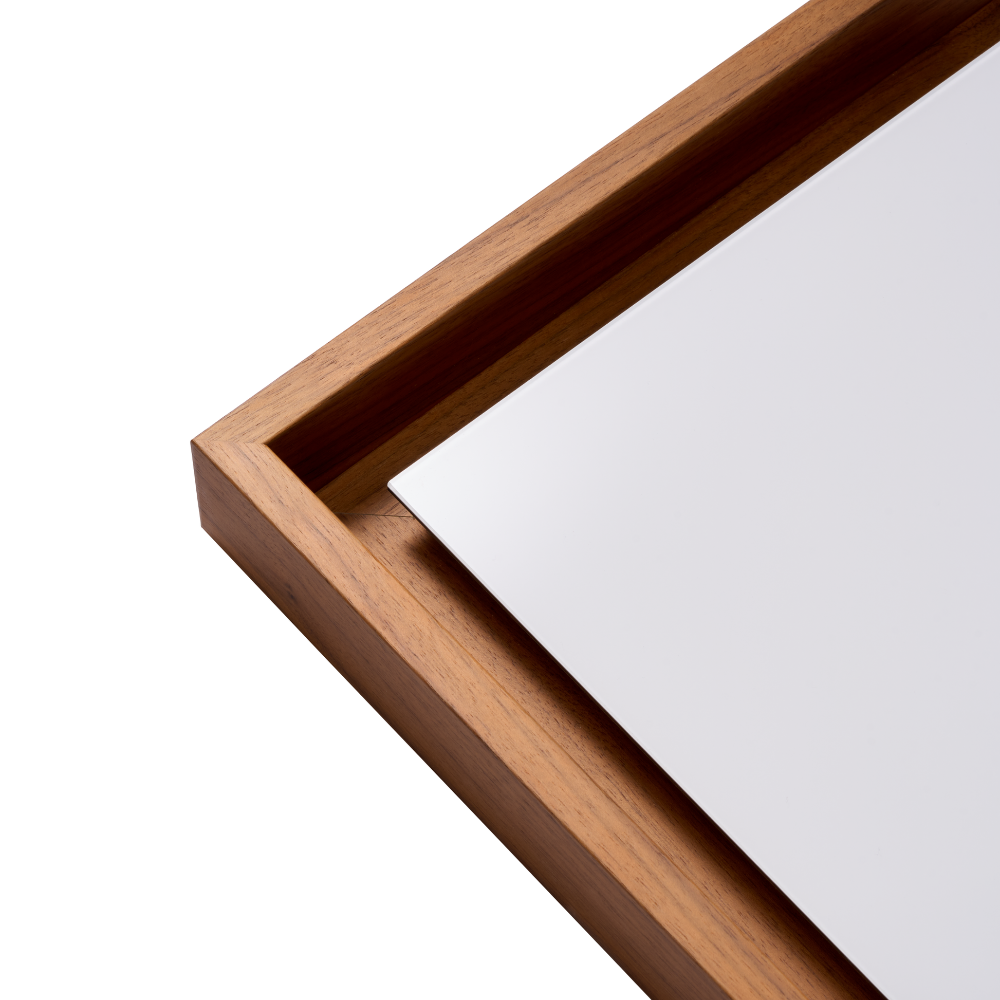 Close-up of a wooden frame corner with a white background